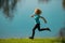 Child boy runners run in park. Outdoor sports and fitness for children, exercise outside.