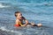 Child boy on sea beach