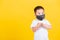 Child boy wearing mask protective for covid-19 or pm2.5 dust he clean hand with sanitizing gel