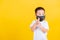 Child boy wearing mask protective for covid-19 or pm2.5 dust he clean hand with sanitizing gel