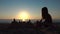 Child Building Castle on Beach at Sunset, Kid Playing in Sands on Seaside, Blonde Girl Plays by Sea, Children in Summer Vacation