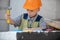 Child in building helmet, hard hat. Child dressed as a workman builder. Portrait little builder in hardhats. Little