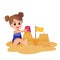 Child builds a sand castle on the beach