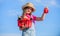 Child carry harvest sky background. Organic food. Sunny day at farm. Natural vitamin nutrition. Crops harvest. Harvest