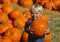 Child Carrying Pumpkin