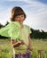 Child catches a butterfly