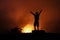 Child celebrates achievement of reaching the crater rim of KÄ«lauea overlook at Volcanoes National Park, Hawaii Big Island.