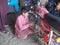 Child - Child working in motor cycle repairing shop in Pakistan