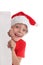 Child in a Christmas hat and the form in hands