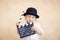 Child with clapper board playing at home