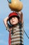 Child climbing in adventure playground