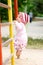 Child climbing on bars