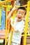 A child climbing a jungle gym.