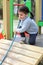 a child is climbing a tightrope in the playground