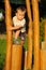 Child climbing wooden steps