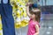 A child in the clothing department in a shopping center. Shopping