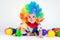 Child clown with a red nose multicolored wig in with balls