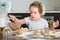 Child cooking meat dumplings