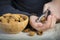 Child cracking almonds