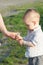 Child with dandelion