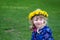 Child with dandelion chain