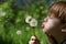 Child and dandelions