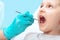 A child at the dentist`s examination close-up