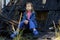 A child and destroyed house. Little girl near the burnt home after bomb attack