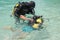 Child discover scuba diving at Cala Mariolu beach on Sardinia