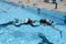 Child discover Scuba Diving on a swimming pool