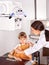 Child with doctor radiologist.