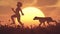 Child and a dog on the field at sunset