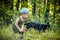 Child and dog in forest