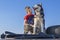 Child and dog look at each other. Boy hugged Siberian husky dog, friendship.