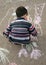 Child drawing with chalk