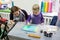 Child drawing with needle on the water. Ebru art is method of aqueous surface design