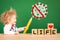 Child drawing sign stop coronavirus covid-19