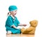 Child dressed as doctor playing with toy