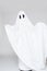 Child dressed as a ghost for halloween