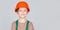 Child dressed as a workman builder. Little boy wearing helmet. Portrait little builder in hardhats. Child building