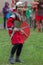 Child dressed in Roman soldier, make one demonstration