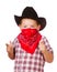 Child dressed up as cowboy playing