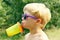 Child Drinking on Hot Summer Day