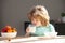 Child drinking milk glass. Close up of cute little boy kid drink tasty organic milk with vitamins calcium from glass