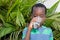 Child drinking water.