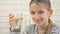 Child Drinking Water, Thirsty Kid Studying Glass of Fresh Water, Girl in Kitchen