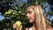 Child Eating Apple, Kid in Orchard, Farmer Girl Studying Fruits in Tree