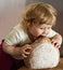 A child eating big bread