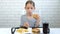 Child Eating Hamburger in Restaurant, Kid Eats Junk Fast Food Hungry Little Girl