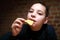 Child eating nachos in restaurant